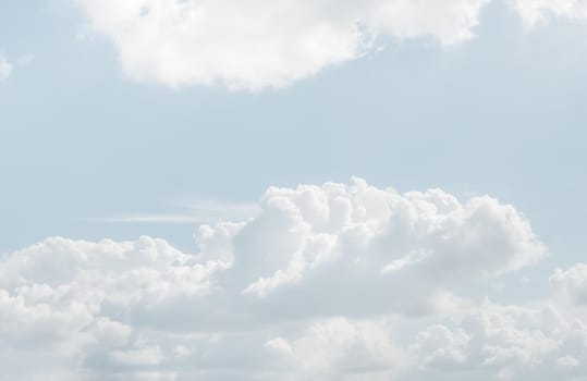 Natural sky background with clouds in light tonality. Abstract nature image for background use.