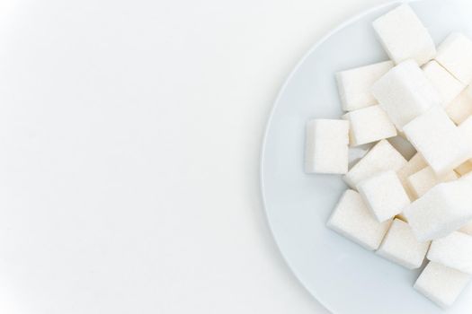 refined sugar on a plate calories sweets. High quality photo