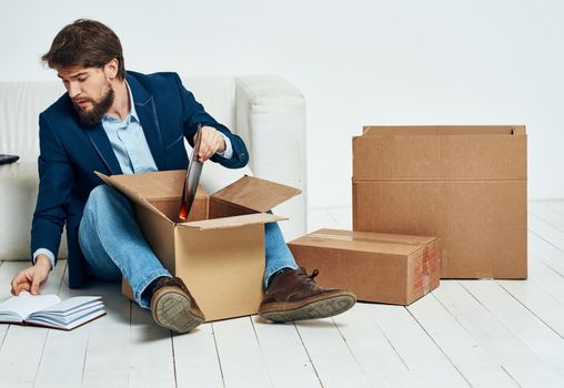 Business man boxes with lifestyle things packing office moving. High quality photo