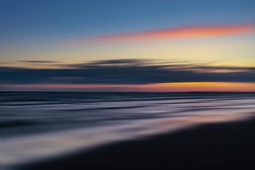 Abstract blurred sea landscape and cloudy sky background