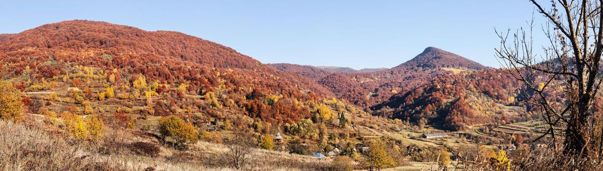 Sunny autumn day in the Carpathian Mountains, Ukraine. Landscape panorama