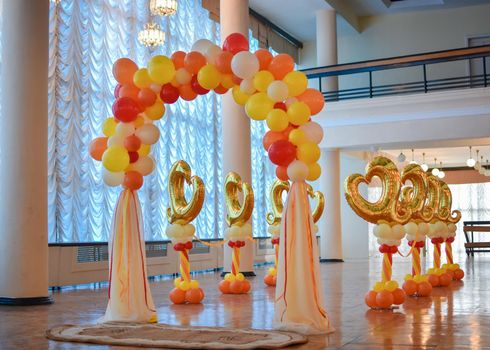 Balloon decorations for the wedding ceremony. Arch for the bride and groom. Without people.