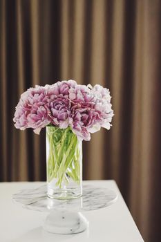 Spring flowers in vase at home, decor and interior ideas