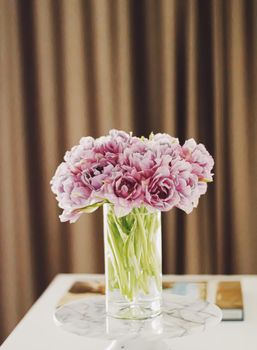 Spring flowers in vase at home, decor and interior ideas
