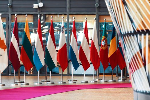 BRUSSELS, BELGIUM - May 13, 2019: Flags on the meeting of EU leaders at the EU headquarters. High Level Conference for Eastern Community Leaders in Brussels