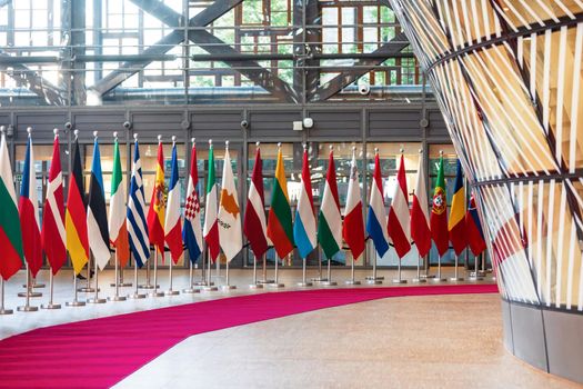 BRUSSELS, BELGIUM - May 13, 2019: Flags on the meeting of EU leaders at the EU headquarters. High Level Conference for Eastern Community Leaders in Brussels