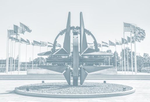 BRUSSELS, BELGIUM - May 13, 2019: Nato star sculpture in Brussels. NATO Headquarters - Political and Administrative Center for the North Atlantic Alliance. Image in light blue tonality