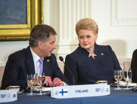 WASHINGTON D.C., USA - Mar 31, 2016: Nuclear Security Summit. President of Finland Sauli Niinisto talks with President of Lithuania Dalia Grybauskaite