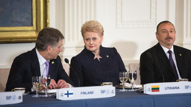WASHINGTON D.C., USA - Mar 31, 2016: Nuclear Security Summit. President of Finland Sauli Niinisto talks with President of Lithuania Dalia Grybauskaite