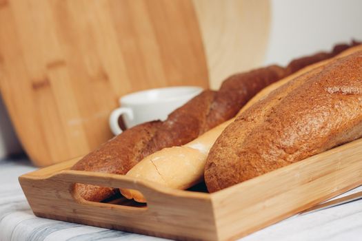 different types of loaves cutting board kitchen cutting for food preparation. High quality photo