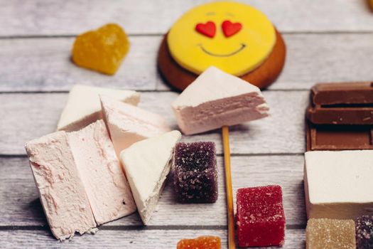 gingerbread on a stick in the form of a smiley candy sweets dessert Holiday. High quality photo