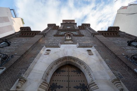 Old church of madrid with blue sky