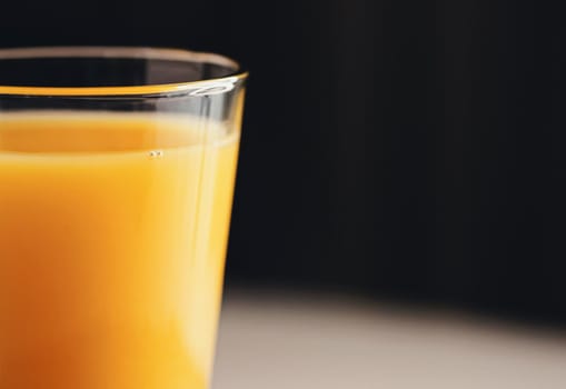 Glass of orange juice, healthy drink closeup