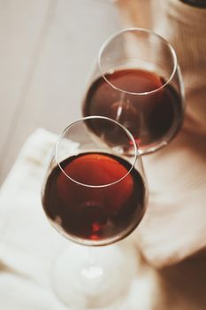 Traditional red house wine served in crystal glasses, closeup