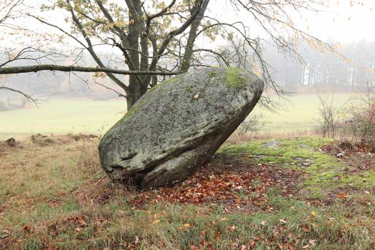 Balanced boulder - interesting rock formation, Radvanov village, Czech Republic