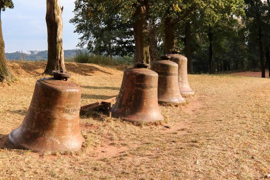 Church bells laid in the landscape, Wambierzyce, Poland