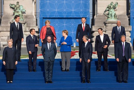 BRUSSELS, BELGIUM - Jul 11, 2018: Jens Stoltenberg, Donald Trump,  Emmanuel Macron and Angela Merkel at the group photo of participants of the NATO military alliance summit