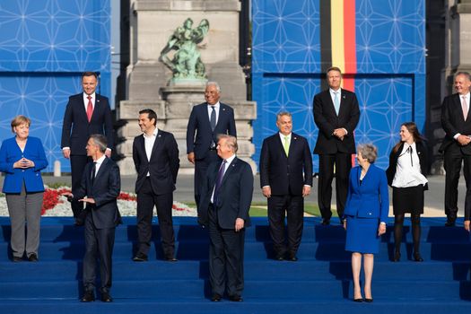BRUSSELS, BELGIUM - Jul 11, 2018: Jens Stoltenberg, Donald Trump, Angela Merkel and Teresa May at the group photo of participants of the NATO military alliance summit