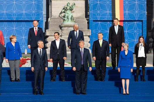 BRUSSELS, BELGIUM - Jul 11, 2018: Jens Stoltenberg, Donald Trump, Angela Merkel and Teresa May at the group photo of participants of the NATO military alliance summit
