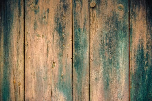 Old faded paint on wooden boards -  wooden pattern useful like vintage background