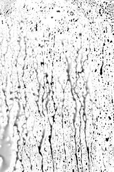 Abstract Black Dropping Splatters on White Surface