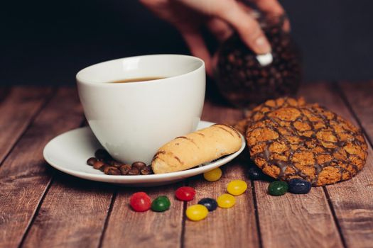 flour products biscuits snack breakfast dessert a cup of coffee. High quality photo