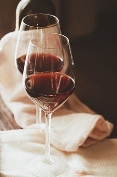 Traditional red house wine served in crystal glasses, closeup