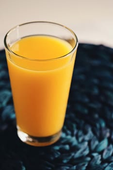 Glass of orange juice, healthy drink closeup