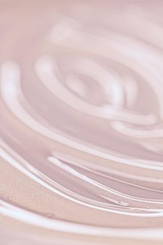 Glowing cosmetic emulsion, rose gold cream or lotion as beauty and skincare background closeup