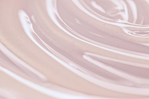 Glowing cosmetic emulsion, rose gold cream or lotion as beauty and skincare background closeup