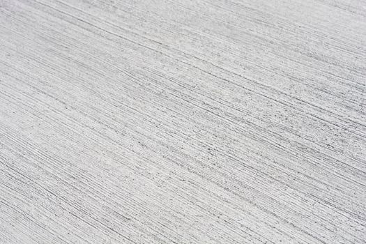 Detail of a white rough concrete floor