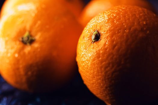 Organic oranges fresh from the garden, healthy food and fruits closeup