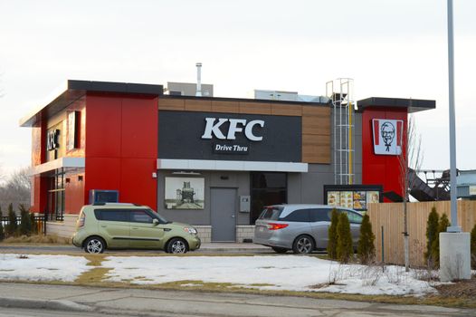 SMITHS FALLS, ONTARIO, CANADA, MARCH 10, 2021: View of the newly built KFC drive thru location in small town Smiths Falls, ON.