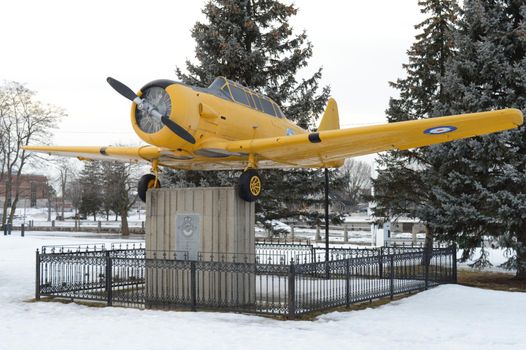SMITHS FALLS, ONTARIO, CANADA, MARCH 10, 2021: A view of the RCAF Royal Canadian Air Force Plane Memorial To those who served in the war found along the pathway in Victoria Park of small town Smiths Falls during the late winter season.