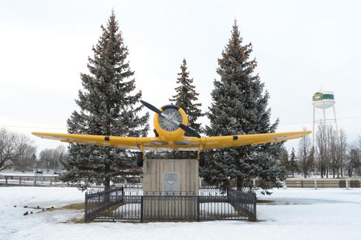 SMITHS FALLS, ONTARIO, CANADA, MARCH 10, 2021: A view of the RCAF Royal Canadian Air Force Plane Memorial To those who served in the war found along the pathway in Victoria Park of small town Smiths Falls during the late winter season.
