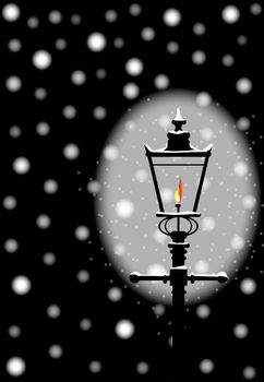 A typical old London gaslight with flame and glow celebrating new year and Christmas