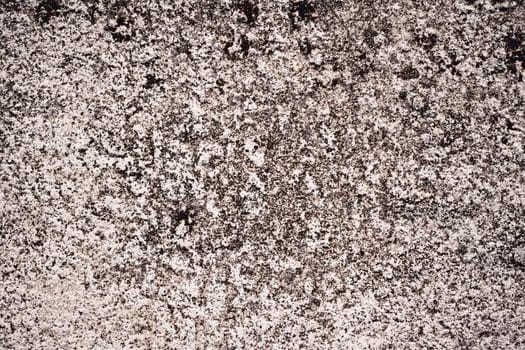 Old concrete wall texture as grunge background and urban detail closeup