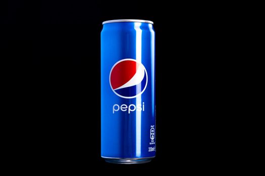 Editorial photo of classic Pepsi can on black background. Studio shot in Bucharest, Romania, 2021