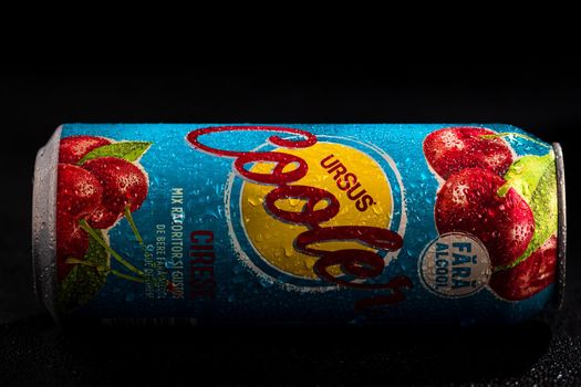 Condensation water droplets on Ursus Cooler beer can isolated on black. Bucharest, Romania, 2020