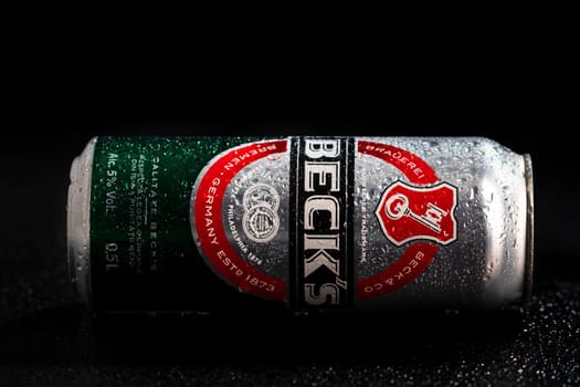 Condensation water droplets on Beck`s beer can isolated on black. Bucharest, Romania, 2020