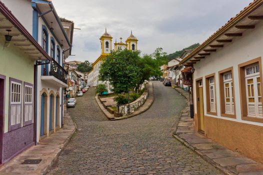 Ouro Preto, Old city street view with a Colonial Church, Brazil, South America