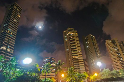 Recife, Beach and modern city view by night, Brazil, South America