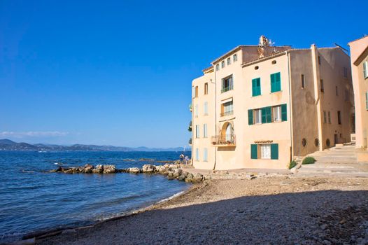 Saint Tropez, Old city view by the beach with colorful houses, Côte d'Azur, France, Europe