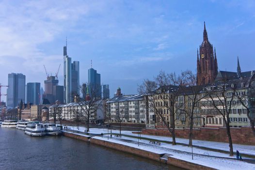 Frankfurt, Snowy day city view by the river Rhein, Germany, Europe