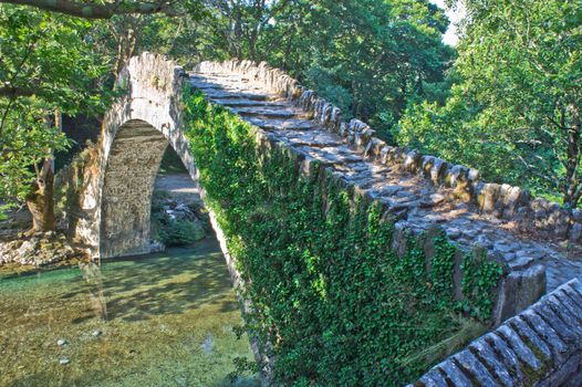 Old stone bridge, Aoos river, Epirus, Greece, Europe