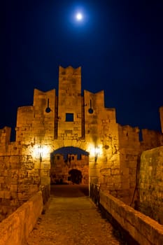 Rhodes Island, Old city street view by night, Castle Gate, Greece, Europe