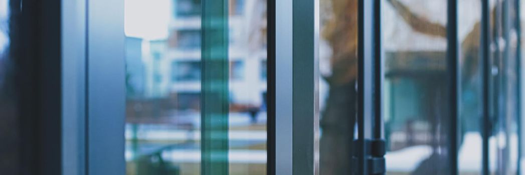 Glass walls as abstract urban background, exterior design and architectural detail closeup