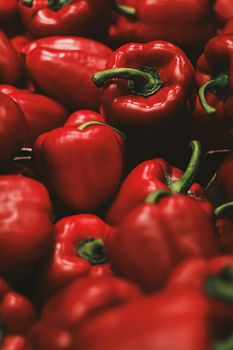 Red bell peppers on farmers market, organic food and agriculture concept