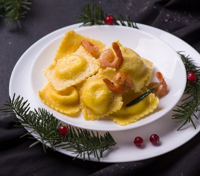 Italian ravioli with seafood on a plate.