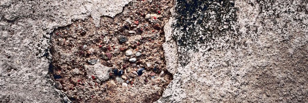 Old concrete wall texture as grunge background and urban detail closeup